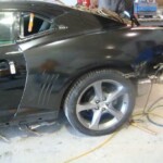 Photographs of a 2014 Chevrolet Camaro that was in an accident and repaired by Elite Paint & Body Shop in West Palm Beach Florida
